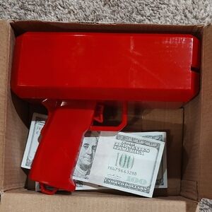 Make It Rain! Sheatee White Money Blasting Gun